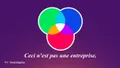 A green, blue, and pink overlapping circle diagram, captioned in French "Ceci n'est pas une entreprise" (This is not a company), referencing René Magritte.
