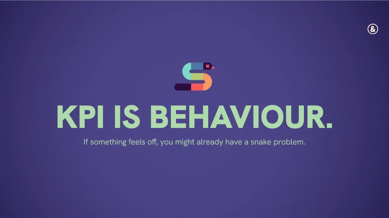 Title card reading “KPI is Behaviour,” with a colorful snake-shaped icon and the subtitle “If something feels off, you might already have a snake problem.”