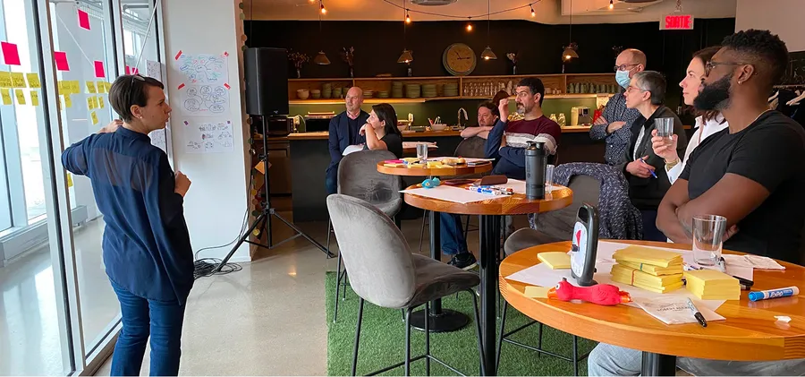 Strategy workshop — presenting to a seated group